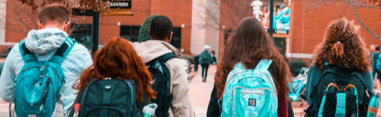 Image of students walking into school