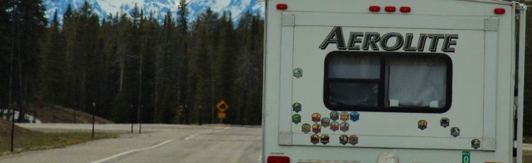 An RV driving on a road