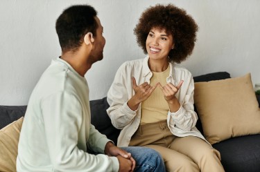 Couple on couch in home