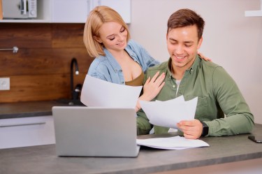 Couple looking at mortgage application